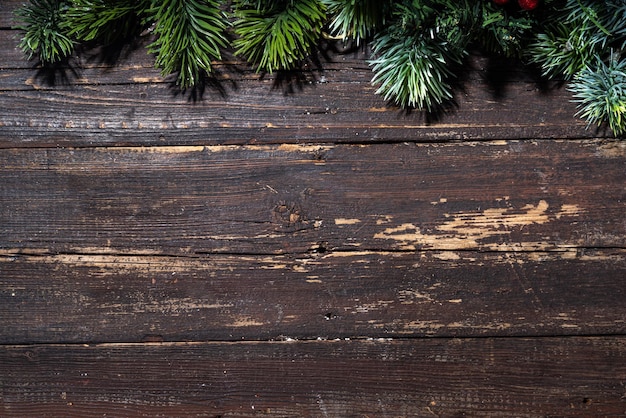 Christmas tree wooden background