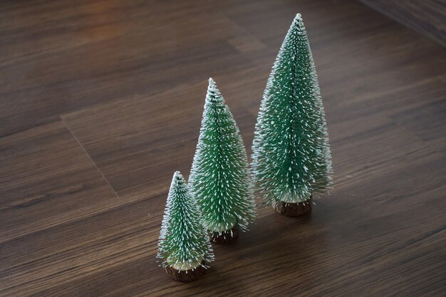 Christmas tree on wooden floor in living room