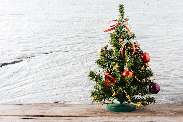 Christmas tree on wooden table