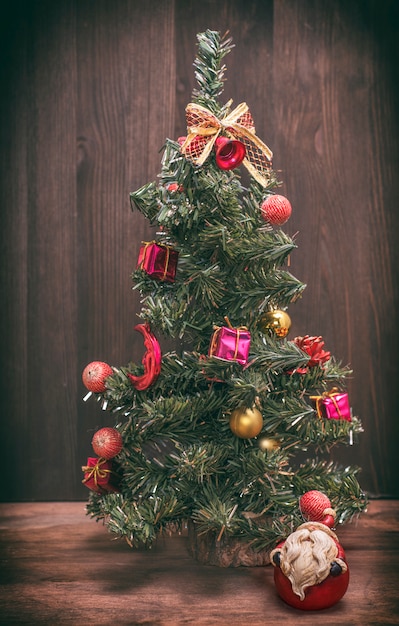 Christmas tree on a wooden