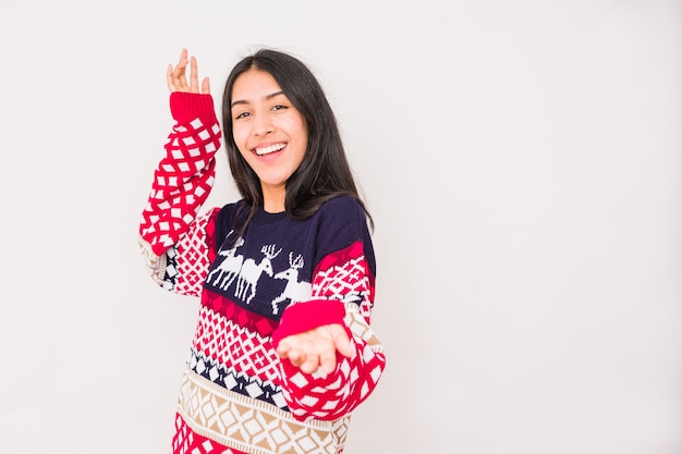 Christmas ugly sweater latin venezuelan woman wearing a fashion woolen xmas style