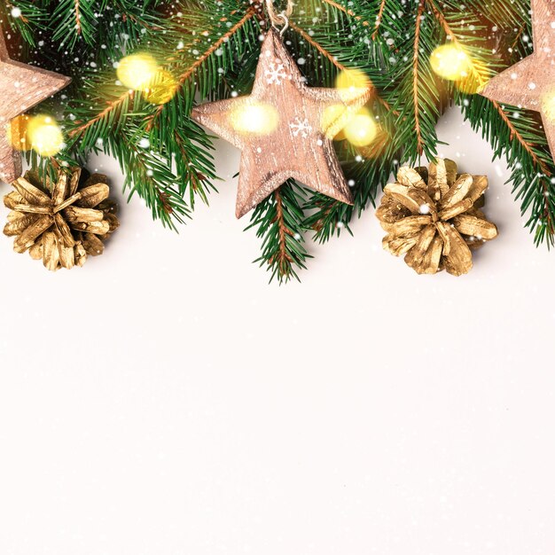 Christmas white background shining gold and pink balls and confetti border