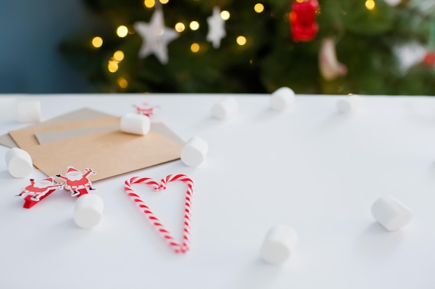 Christmas white background with envelope candycane