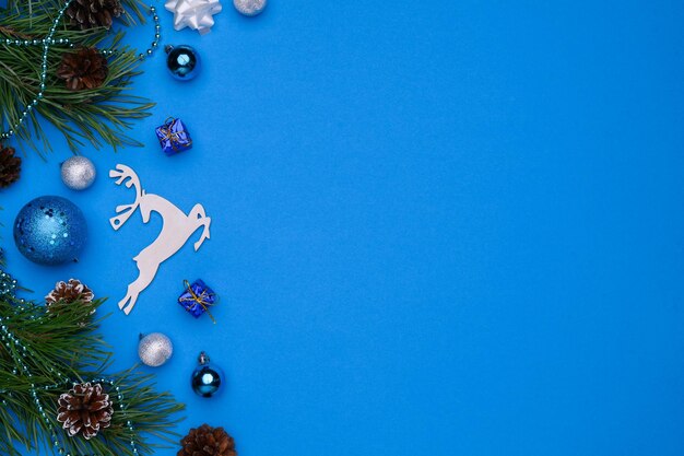 Christmas winter composition Layout on a blue background Christmas winter new year Flat lay top view Copy space