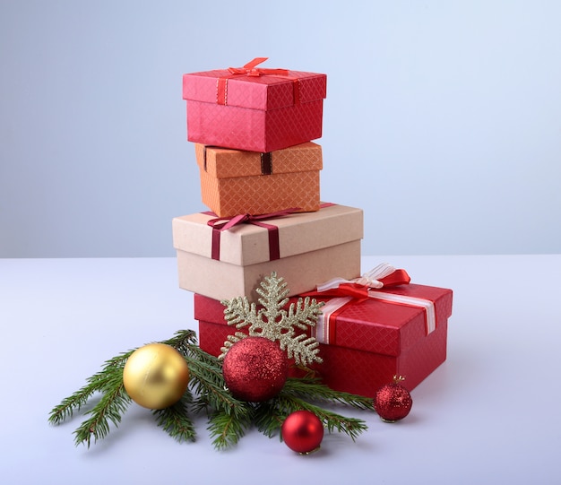 Christmas  with decorations and gift boxes on wooden board