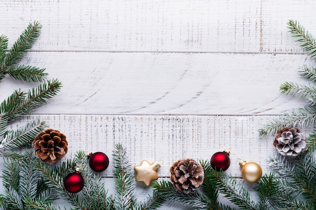 Christmas with fir branches, pinecones and berries