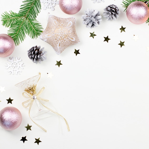 Christmas with fir tree branches, pink and silver decorations