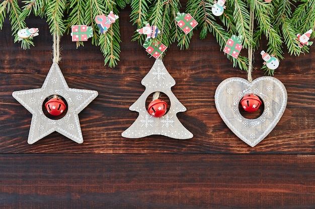 Christmas wooden background with heart star christmas tree