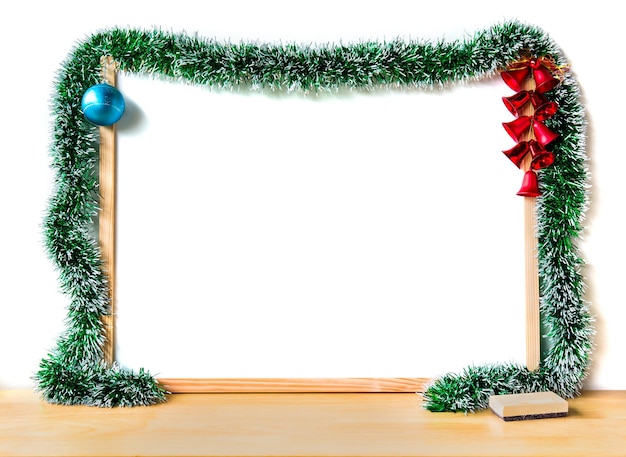 Photo christmas wooden frame on table for decorate background picture wood frame for text merry christmas and happy new year