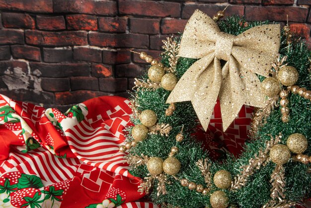 Christmas wreath, beautiful Christmas wreath on a table with rustic background, selective focus.