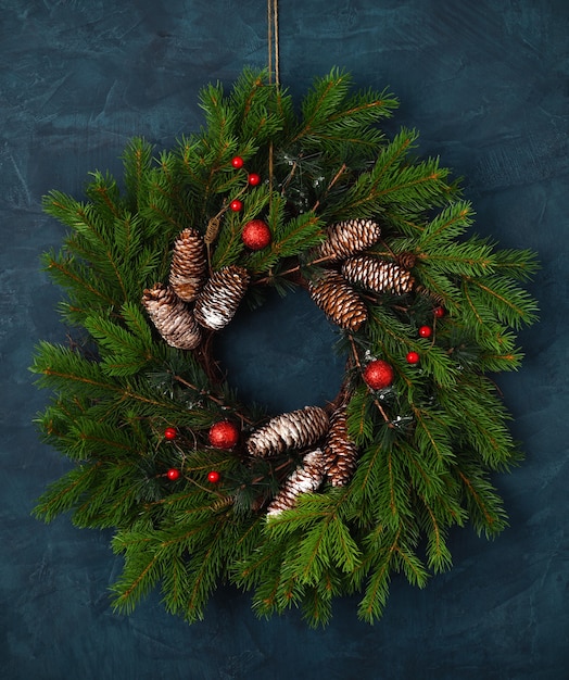 Christmas wreath on blue background