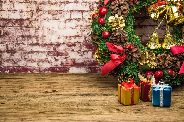 Christmas wreath on  brick wall background