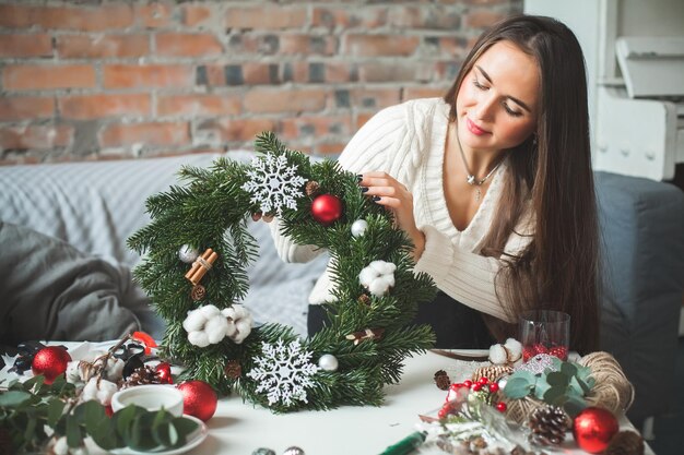 Christmas Wreath in Florist's Workspace