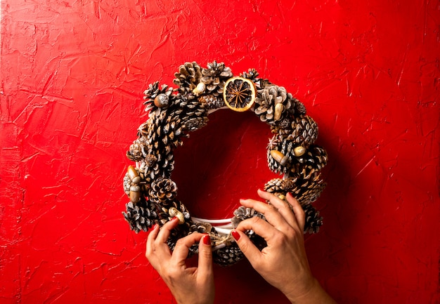 Christmas Wreath held by hand