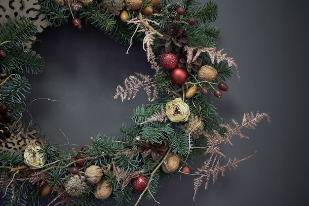 Christmas wreath of vines decorated with fir branches