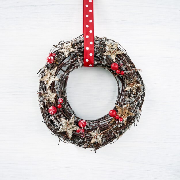 Christmas wreath on white wooden  Christmas decoration, copyspace