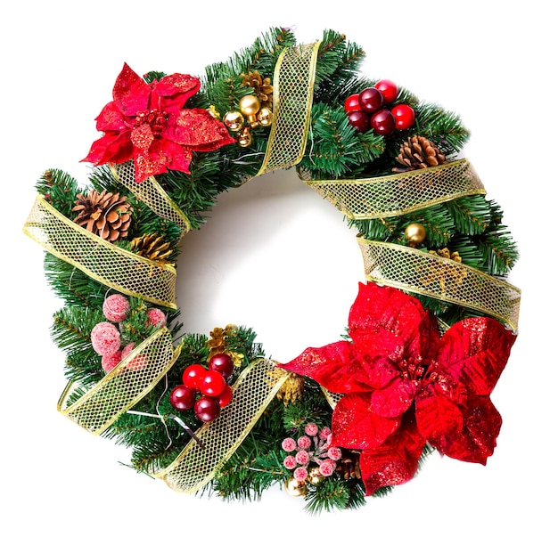 Photo christmas wreath with decorations isolated on white background.