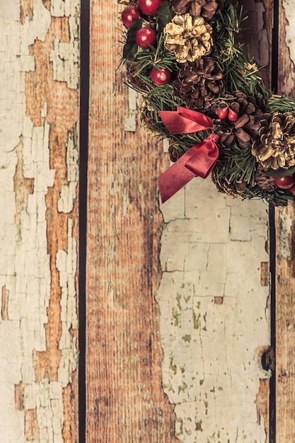 christmas wreath on wood background