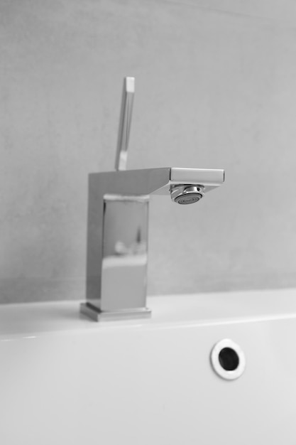 Chrome tap in the bathroom