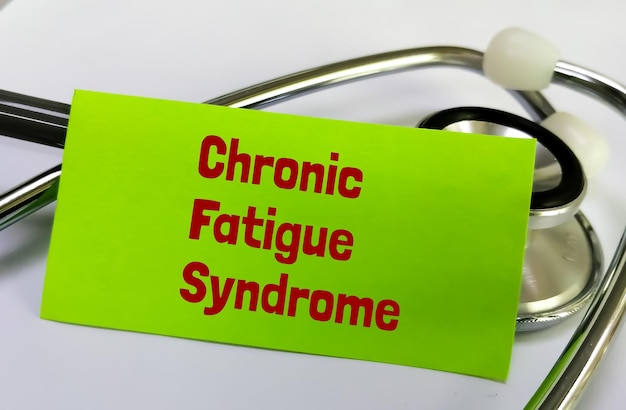 Photo chronic fatigue syndrome medical term on a card. medical and health conceptual image.