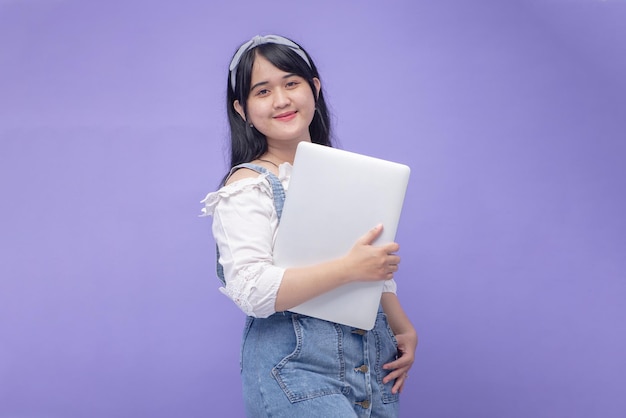 Chubby Asian Woman Isolated on Purple Background