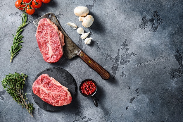 chuck steak on black slate