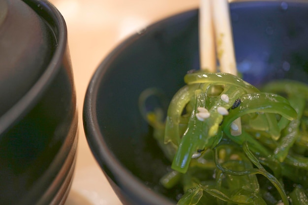 Chuka seaweed salad with chopsticks