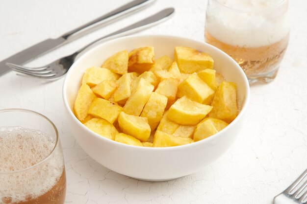 Chunks of chips in small porcelain bowl