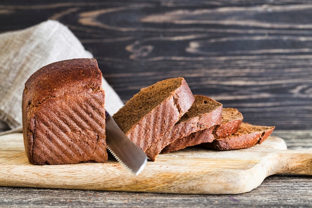 Chunks of dark bread made from rye flour, close-up of food