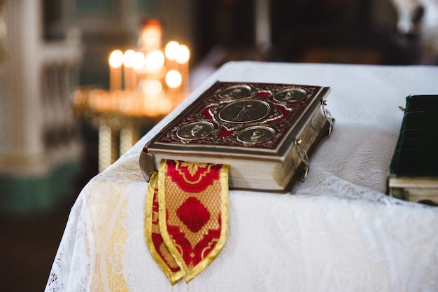 Church book on white tablecloth