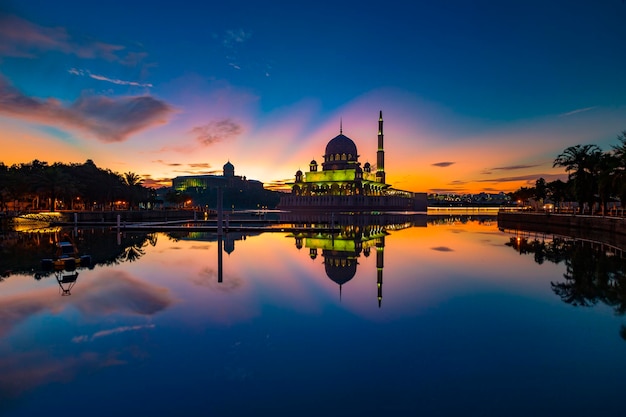 Church by lake at sunset