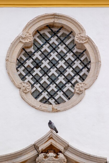 Church of Carmo close up on the windows located in Faro, Portugal.