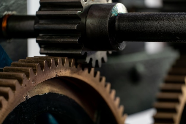 Church clockwork the gear mechanism of a large old tower clock\
antique large clock mechanism with gears and cogs after\
restoration