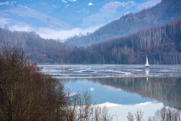 Church and drowned village at Geamana lake Polluted lake with mining residuals