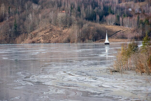 Church flooded and submerged by toxic waste waters from a copper and gold mine Geamana Rosia Montana Romania