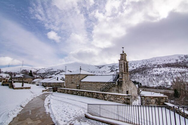 Church of Padornelo after a snowfall in winter