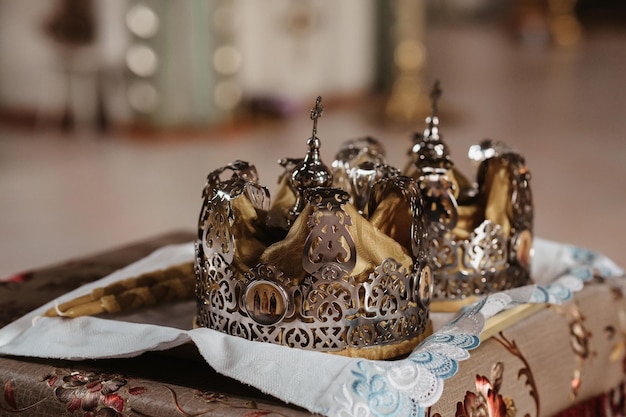 CHURCH OF THE RESURRECTION VICHUGA RUSSIA MAY 08 2022 Golden crowns for Orthodox Christian wedding ceremony in church