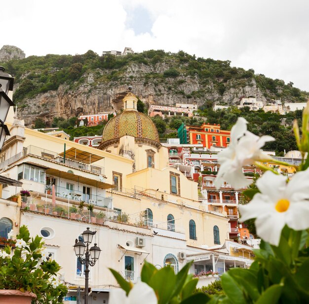 Church of santa maria assunta with flowers in positano amalfi coast italy