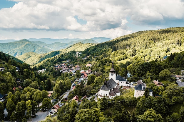 Church in The Spania Dolina village with mining landscape Slovakia Europe