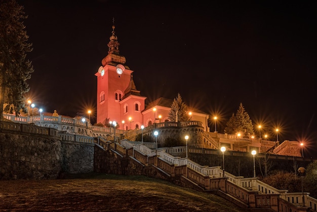 Church at town Ruzomberok Slovakia illuminated in red due event Red Wednesday 2020