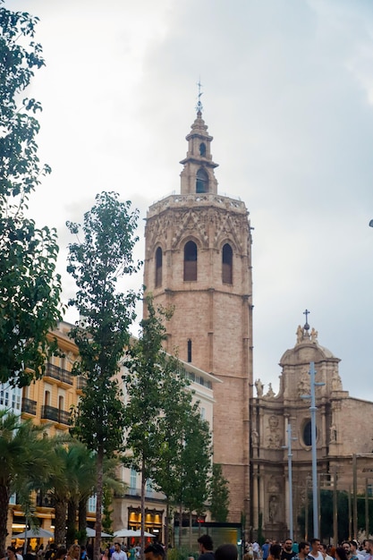 A church with a bell tower that has a bell tower on it