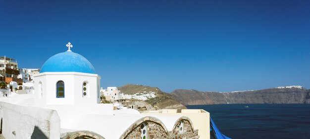 Church with blue cupola at Oia Village, Santorini island.