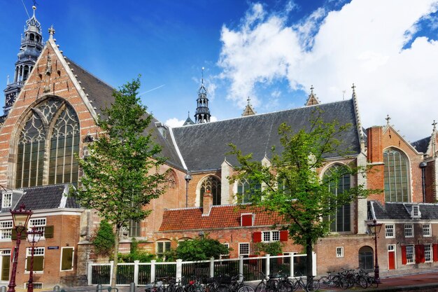 A church with a brick building and a brick building with a sign that says'the word church '