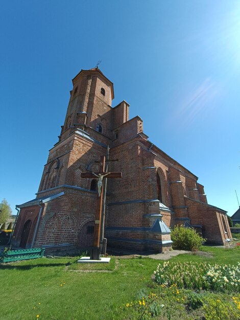 A church with a cross on the top of it