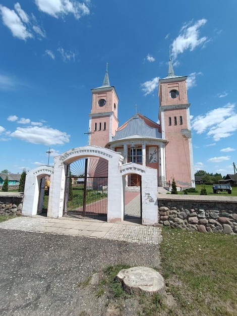 A church with a large gate that says'church of the holy spirit '