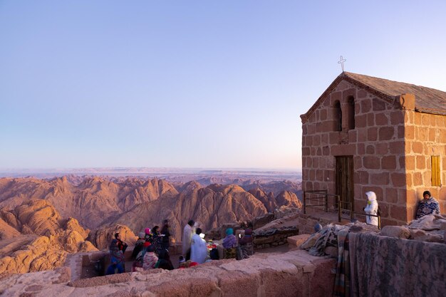 Church worship on greek orthodox chapel on mount sinai\
beautiful dawn in egypt early morning view of the top of\
mountain