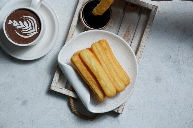 churros spanish traditional dessert and chocolate dipping