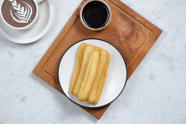 churros spanish traditional dessert and chocolate dipping