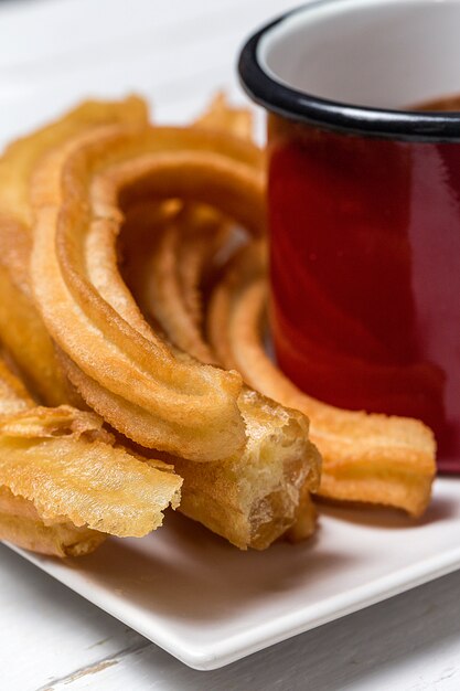 Photo churros with hot chocolate