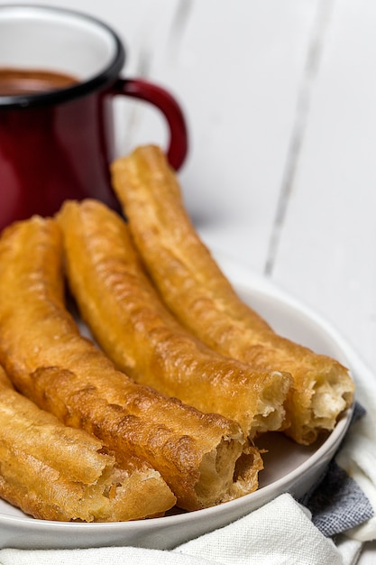 Photo churros with hot chocolate